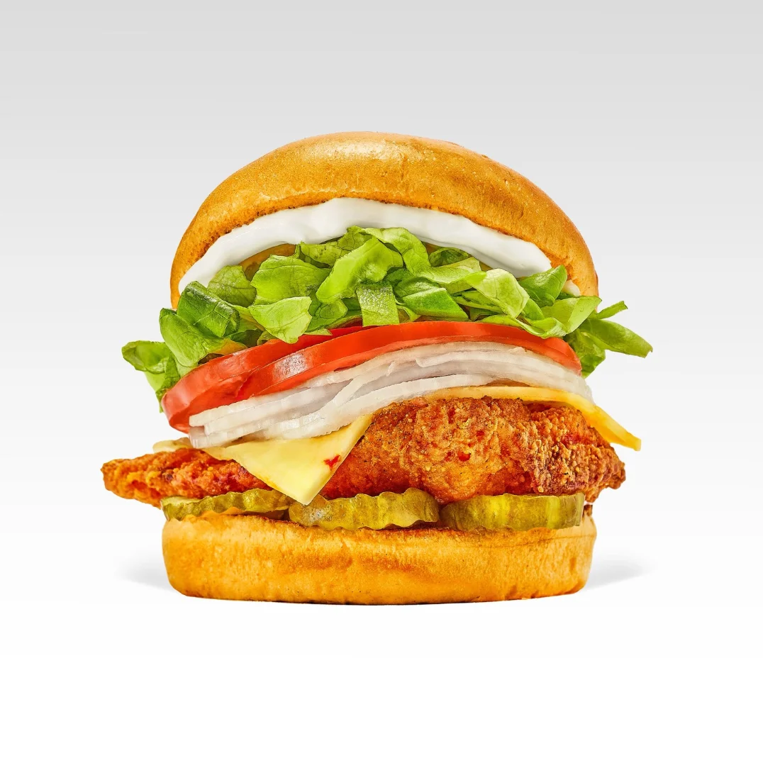 Tony's flagship burger — stacked, toasted and still hot.